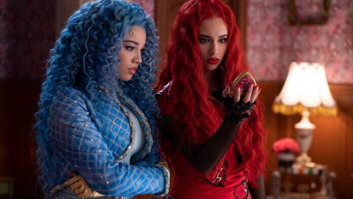 Chloe, played by Malia Baker, stands next to Princess Red, played by Kylie Cantrall, in a scene from Disney Branded Television
